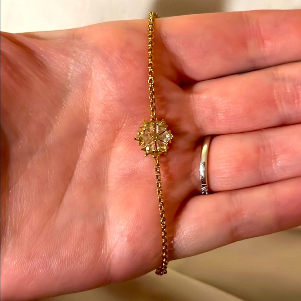 Gold chain bracelet with stones